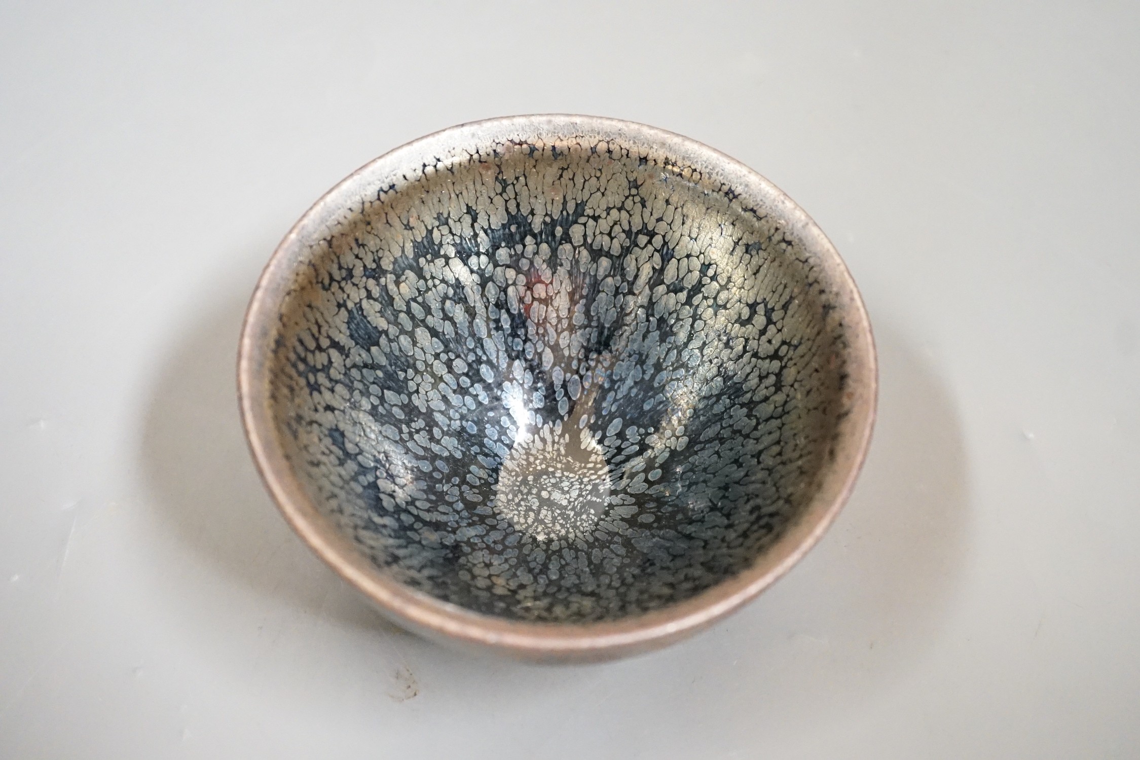 A Chinese Jian type silver hare's fur bowl, 7cms high